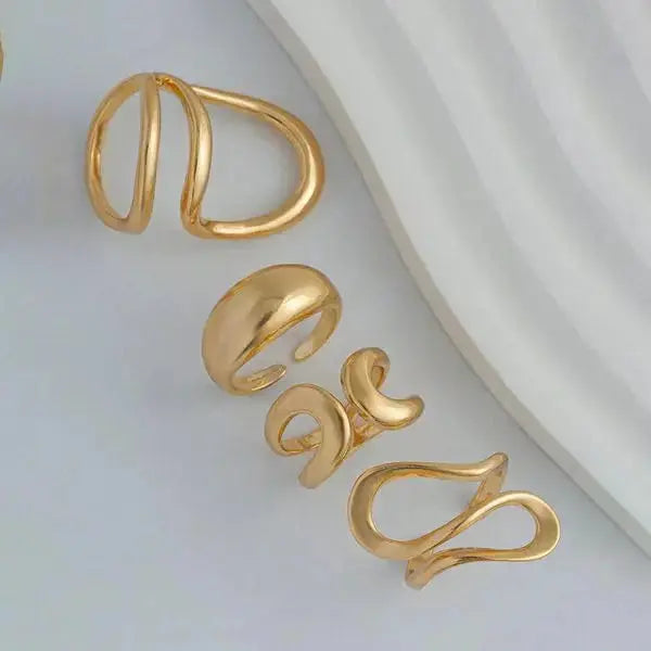 Aurelva Gold Plated Abstract Shape Finger Rings Set for Women and Girls | Adjustable Stackable Fashion Jewellery (Set of 4) Aurelva