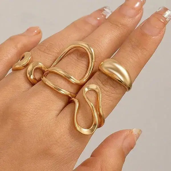 Aurelva Gold Plated Abstract Shape Finger Rings Set for Women and Girls | Adjustable Stackable Fashion Jewellery (Set of 4) Aurelva